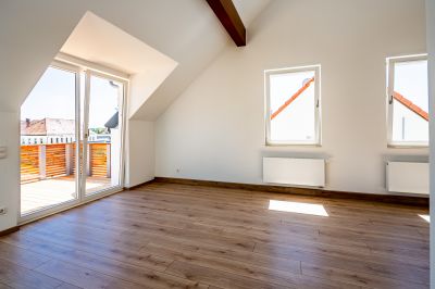 Abbildung: ein ausgebautes Dachgeschoss mit viel Freiraum…